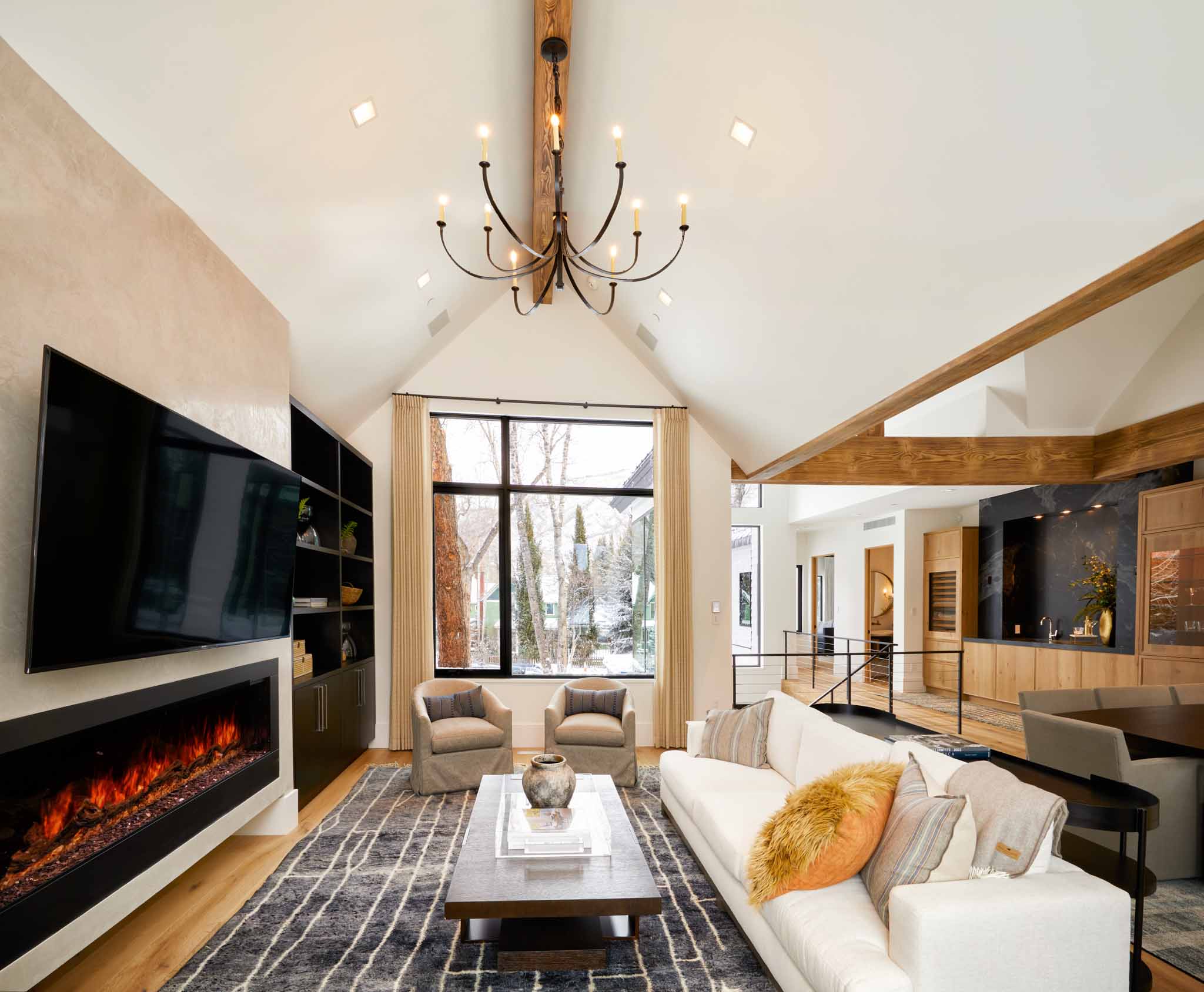 Interior living room overlooking bar and stair area of the Hallam development