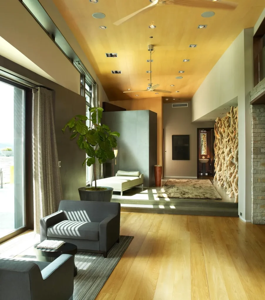 Interior hallway area with seating area in front of bay windows at Smuggler Mountain Residence