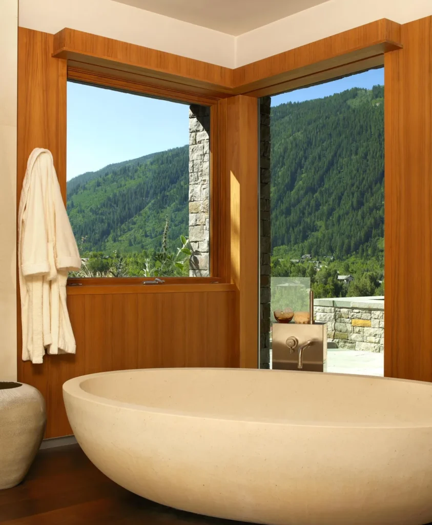 Interior bathroom view of large white bowl tub at Smuggler Mountain Residence